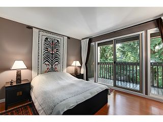 Photo 11: 1065 HERITAGE Boulevard in North Vancouver: Seymour Townhouse for sale in "HERITAGE IN THE WOODS" : MLS®# V1026380