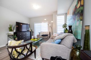 Photo 9: 813 Sage Hill Grove NW in Calgary: Sage Hill Row/Townhouse for sale : MLS®# A2125205