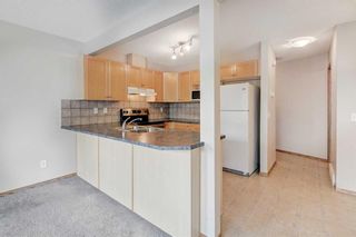 Photo 11: 52 Covemeadow Manor NE in Calgary: Coventry Hills Row/Townhouse for sale : MLS®# A2054046