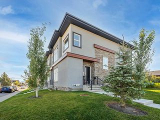 Photo 2: 1104 40 Street SW in Calgary: Rosscarrock Row/Townhouse for sale : MLS®# A2083001
