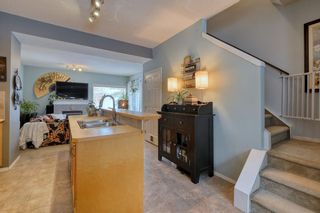 Photo 4: 1 Bridlewood View SW in Calgary: Bridlewood Row/Townhouse for sale : MLS®# A1204882