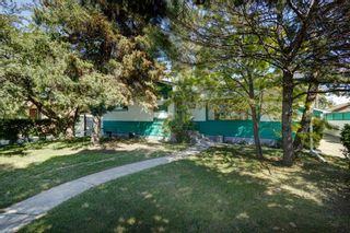 Photo 1: 103 Gainsborough Drive SW in Calgary: Glamorgan Detached for sale : MLS®# A2071859