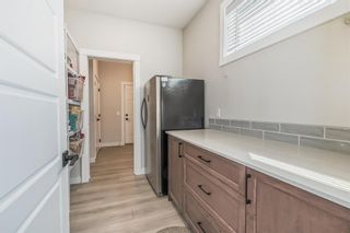 Photo 10: 80 Creekside Green in Calgary: House for sale : MLS®# A2044678