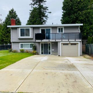 Photo 1: 20069 45 Avenue in Langley: Langley City House for sale : MLS®# R2520175