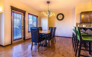 Photo 7: 30 WEST POINTE Manor: Cochrane House for sale : MLS®# C4150247
