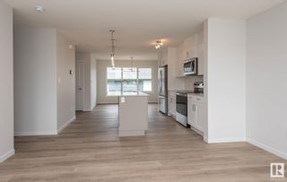 Photo 4: 5702 JUCHLI Avenue in Edmonton: Zone 27 Attached Home for sale : MLS®# E4288449
