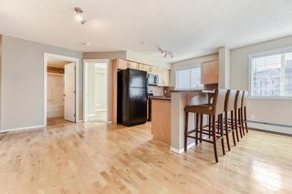 Photo 5: 1312 5 Country Village Park NE in Calgary: Country Hills Village Apartment for sale : MLS®# A2004185