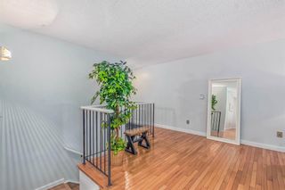 Photo 14: 106 Strathlorne Mews SW in Calgary: Strathcona Park Row/Townhouse for sale : MLS®# A2028228