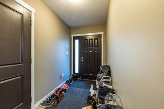 Photo 2: 107 7400 CREEKSIDE Way in Prince George: Lower College Townhouse for sale in "Creekside" (PG City South (Zone 74))  : MLS®# R2662455