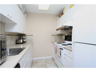 Photo 6: 207 4950 MCGEER Street in Vancouver: Collingwood VE Condo for sale in "Carleton" (Vancouver East)  : MLS®# V974793