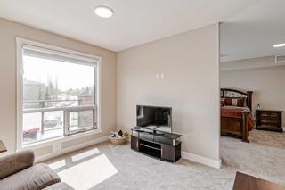 Photo 21: 409 15 Cougar Ridge Landing SW in Calgary: Patterson Apartment for sale : MLS®# A2127724