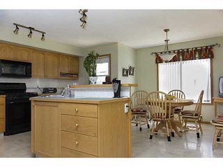 Photo 3: 11 WESTFALL Crescent in : Okotoks Residential Detached Single Family for sale : MLS®# C3619758
