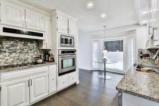 Photo 10: 103 COACH LIGHT Bay SW in Calgary: Coach Hill Detached for sale : MLS®# A1026742