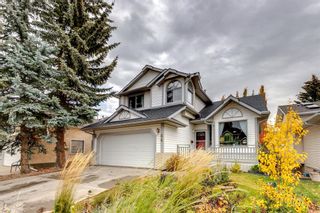 Photo 1: 64 Woodmark Crescent SW in Calgary: Woodbine Detached for sale : MLS®# A2012799