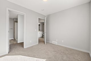 Photo 25: 806 32 Red Embers Parade NE in Calgary: Redstone Row/Townhouse for sale : MLS®# A2032219