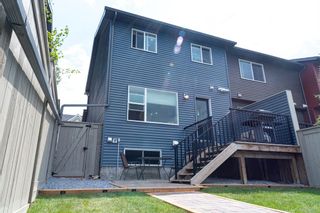 Photo 3: 52 Evansridge Court NW in Calgary: Evanston Row/Townhouse for sale : MLS®# A1235597