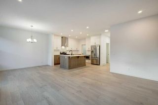 Photo 4: 125 Amblehurst Green NW in Calgary: C-527 Detached for sale : MLS®# A2098783