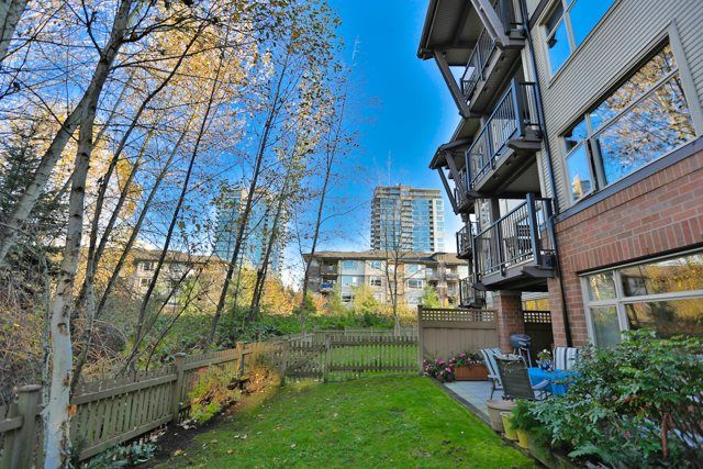 Main Photo: 102 400 KLAHANIE Drive in Port Moody: Port Moody Centre Condo for sale in "TIDES" : MLS®# R2013966
