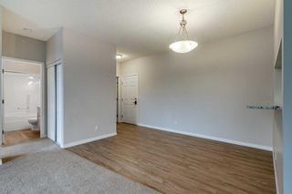 Photo 5: 316 2022 Canyon Meadows Drive SE in Calgary: Queensland Apartment for sale : MLS®# A2059840