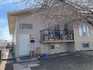 Main Photo: 204 Fonda Drive SE in Calgary: Forest Heights Semi Detached (Half Duplex) for sale : MLS®# A2051327
