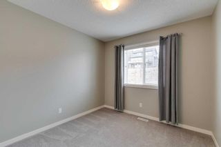 Photo 13: 217 Sunset Point: Cochrane Row/Townhouse for sale : MLS®# A2120759