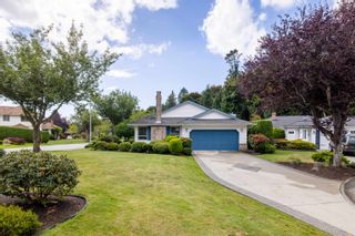 Photo 2: 1125 163 Street in Surrey: King George Corridor House for sale in "McNally Creek" (South Surrey White Rock)  : MLS®# R2757708