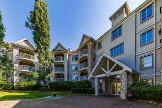 Photo 2: 121 20894 57 Avenue in Langley: Langley City Condo for sale : MLS®# R2302015
