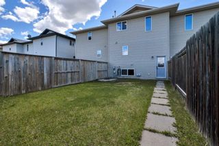 Photo 12: 52 Terrace Heights Drive: Lacombe Row/Townhouse for sale : MLS®# A2143953