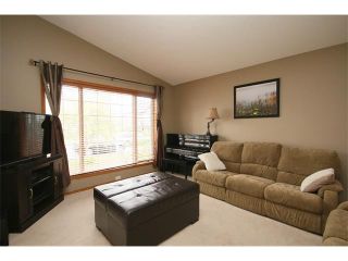 Photo 3: 197 QUIGLEY Drive: Cochrane House for sale : MLS®# C4015396
