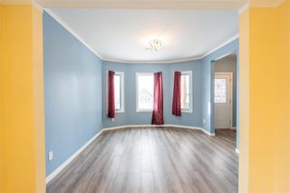 Photo 2: 699 Arlington Street in Winnipeg: West End Residential for sale (5A)  : MLS®# 202301271