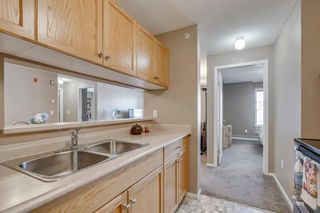 Photo 7: 3303 TUSCARORA Manor NW in Calgary: Tuscany Apartment for sale : MLS®# A1036572