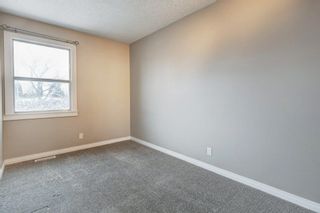 Photo 19: 4403 Bow Trail SW in Calgary: Rosscarrock Row/Townhouse for sale : MLS®# A2022311