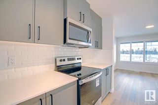 Photo 9: 5724 JUCHLI Avenue in Edmonton: Zone 27 Attached Home for sale : MLS®# E4322287