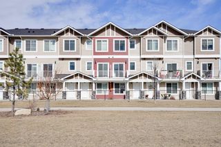 Photo 1: 67 Redstone Circle NE in Calgary: Redstone Row/Townhouse for sale : MLS®# A1214698