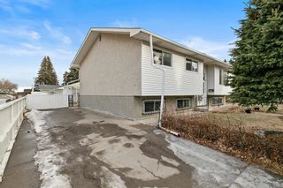 Photo 4: 7740 Hunterquay Road NW in Calgary: Huntington Hills Detached for sale : MLS®# A2021746