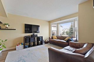 Photo 11: 41 Sandarac Villas NW in Calgary: Sandstone Valley Row/Townhouse for sale : MLS®# A2072802