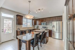 Photo 10: 504 Windbrook Heights SW: Airdrie Detached for sale : MLS®# A2093439