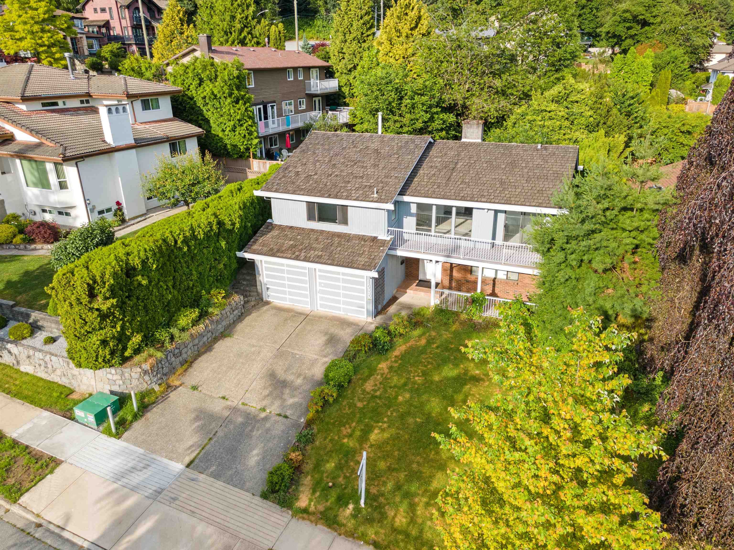 Main Photo: 1050 AYSHIRE Drive in Burnaby: Simon Fraser Univer. House for sale (Burnaby North)  : MLS®# R2744879
