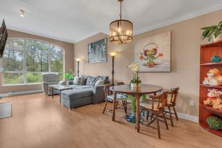 Photo 3: 407 2551 PARKVIEW Lane in Port Coquitlam: Central Pt Coquitlam Condo for sale in "Crescent on Reeve Park" : MLS®# R2716958