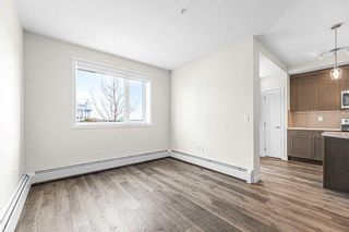 Photo 4: 16 30 Shawnee Common SW in Calgary: Shawnee Slopes Apartment for sale : MLS®# A2123007