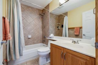 Photo 23: 77 Rockbluff Place NW in Calgary: Rocky Ridge Detached for sale : MLS®# A2124838