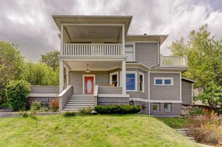 Main Photo: 1931 12 Avenue SW in Calgary: Scarboro Detached for sale : MLS®# A2135906