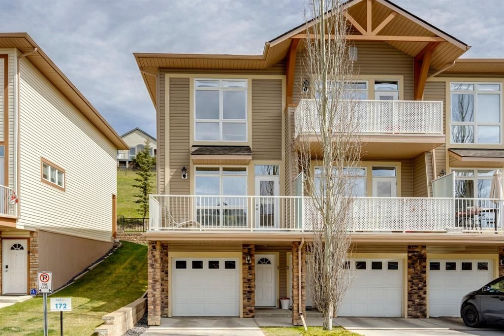 Main Photo: 1 172 Rockyledge View NW in Calgary: Rocky Ridge Row/Townhouse for sale : MLS®# A1218790