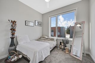 Photo 26: 142 Shawnee Common SW in Calgary: Shawnee Slopes Row/Townhouse for sale : MLS®# A1237424