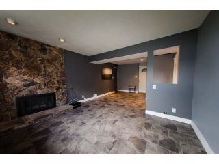 Photo 10: 1001 WINDWARD Drive in Coquitlam: Ranch Park House for sale in "Ranch Park" : MLS®# R2248714