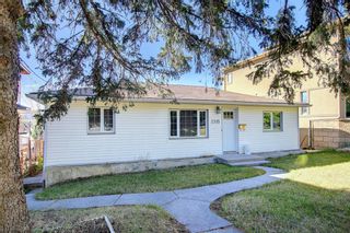 Photo 1: 2315 48 Street NW in Calgary: Montgomery Detached for sale : MLS®# A2006311