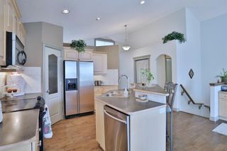 Photo 12: 12 Strathridge Way SW in Calgary: Strathcona Park Detached for sale : MLS®# A2046710