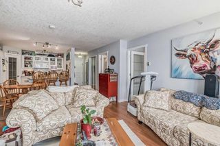 Photo 7: 403 40 Parkridge View SE in Calgary: Parkland Apartment for sale : MLS®# A2105328