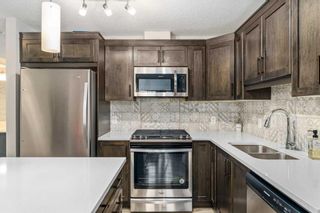 Photo 8: 907 Cranbrook Walk SE in Calgary: Cranston Row/Townhouse for sale : MLS®# A2125451