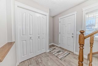 Photo 3: 47 Springbank Mews SW in Calgary: Springbank Hill Detached for sale : MLS®# A2118832